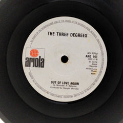 The Three Degrees - Out of Love Again / Woman in Love (45-RPM)