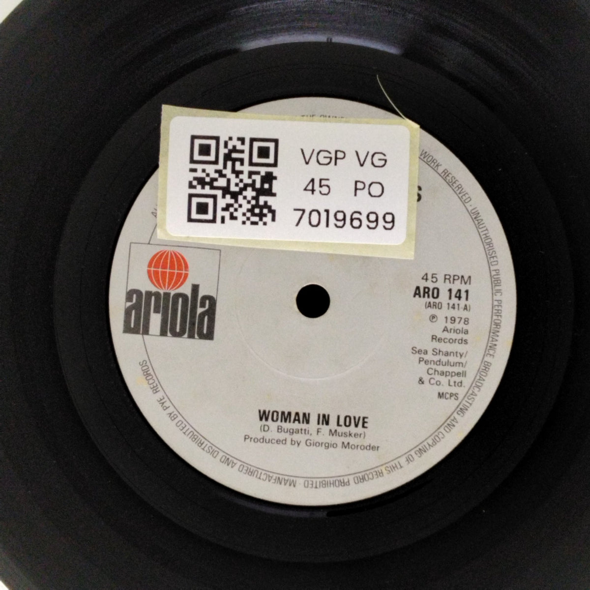 The Three Degrees - Out of Love Again / Woman in Love (45-RPM)